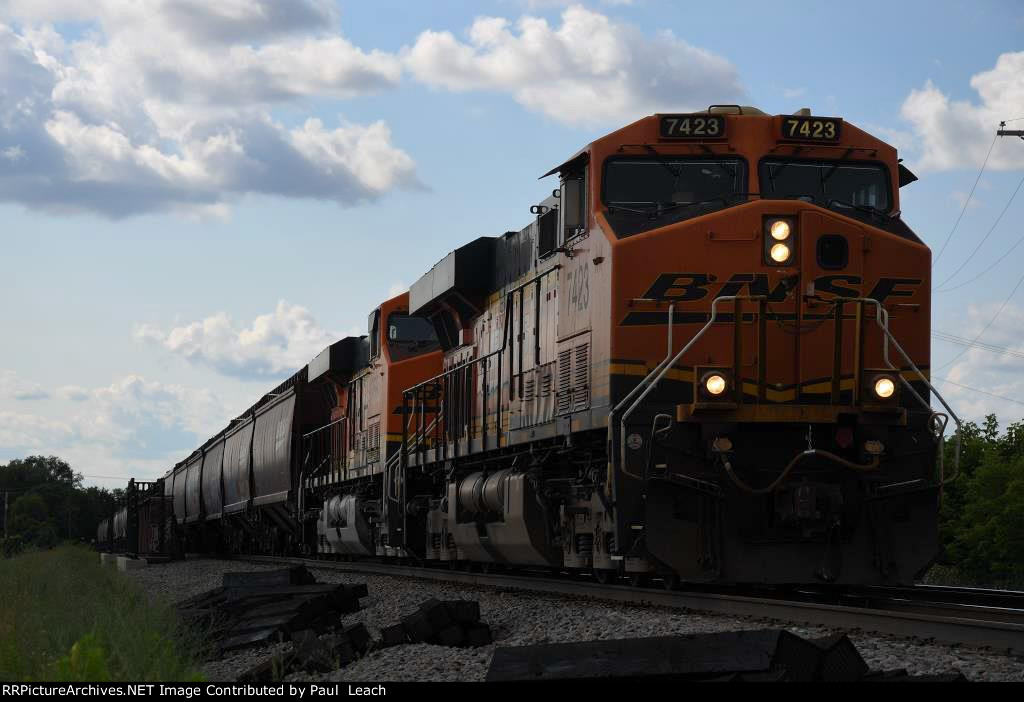 Grain train rolls east